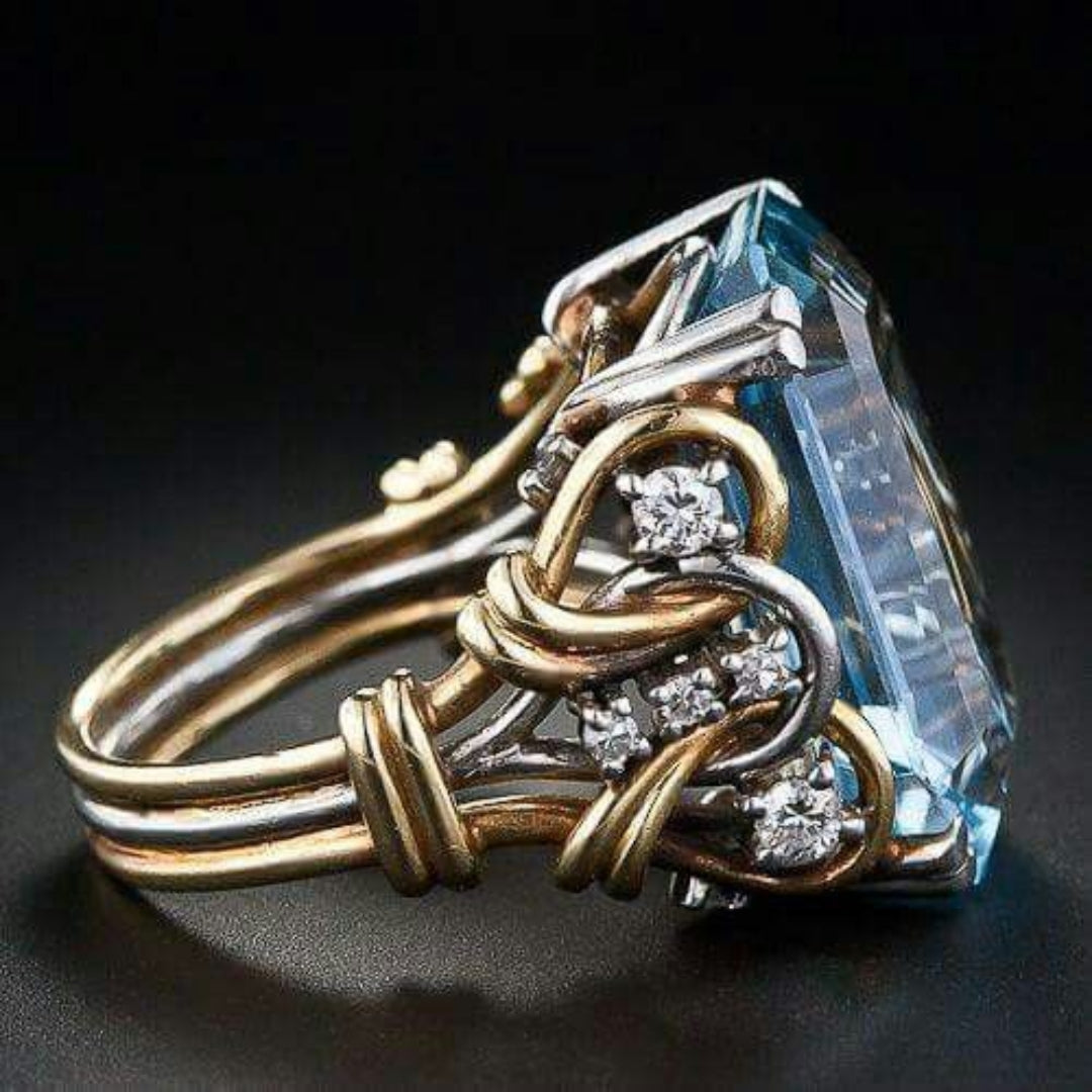Vintage layered gold ring with blue zirconia