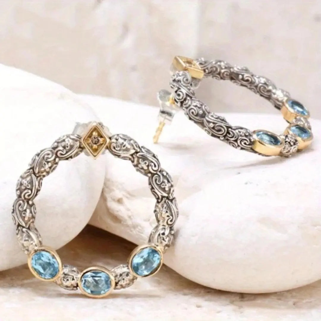 Vintage earrings with inlaid blue crystals