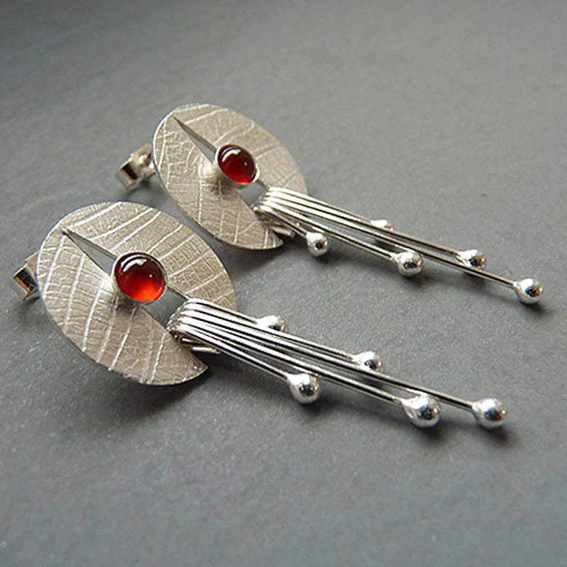 Earrings with red crystal