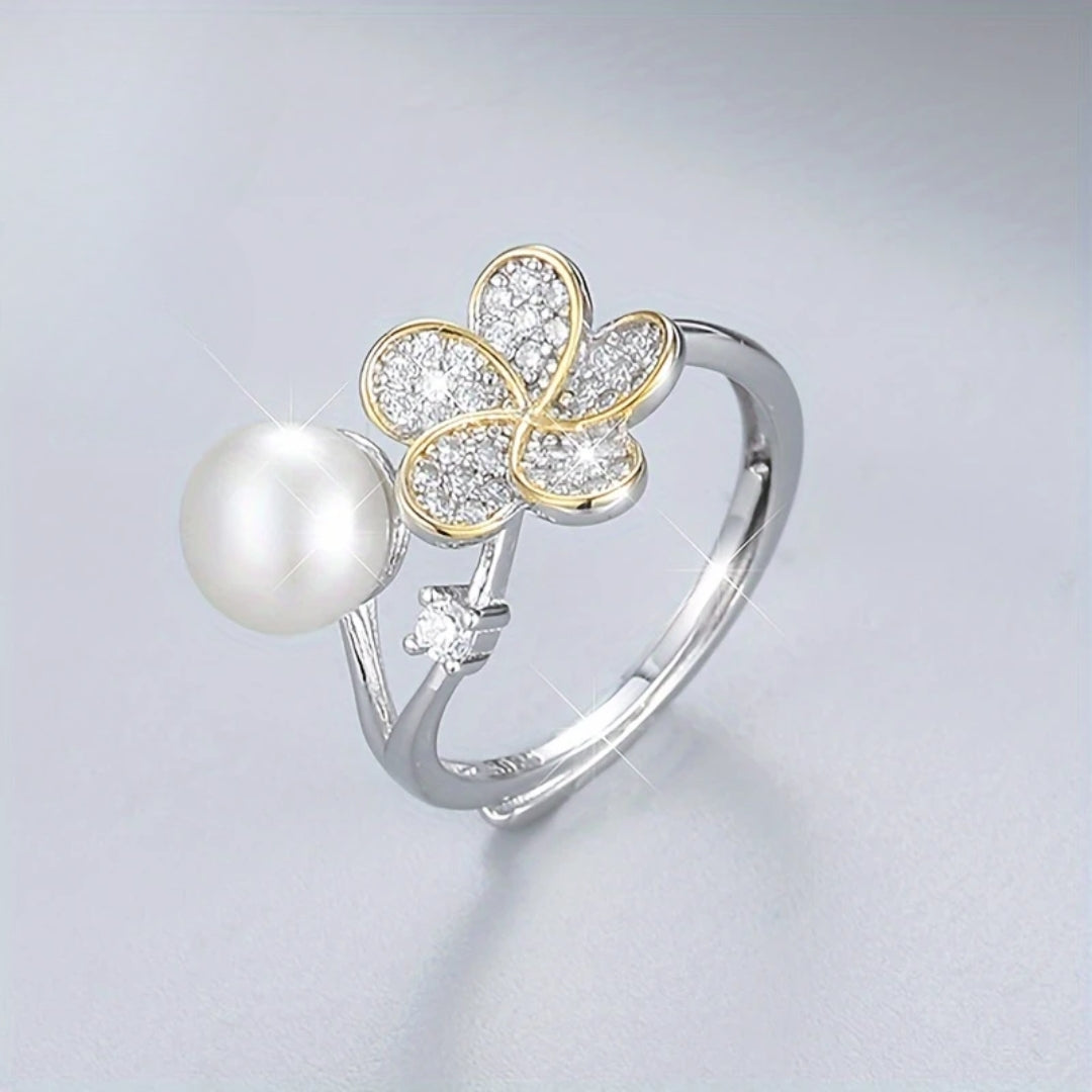 Sparkling silver ring with pearl and flower