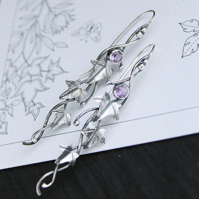 Elf earrings with blue crystal