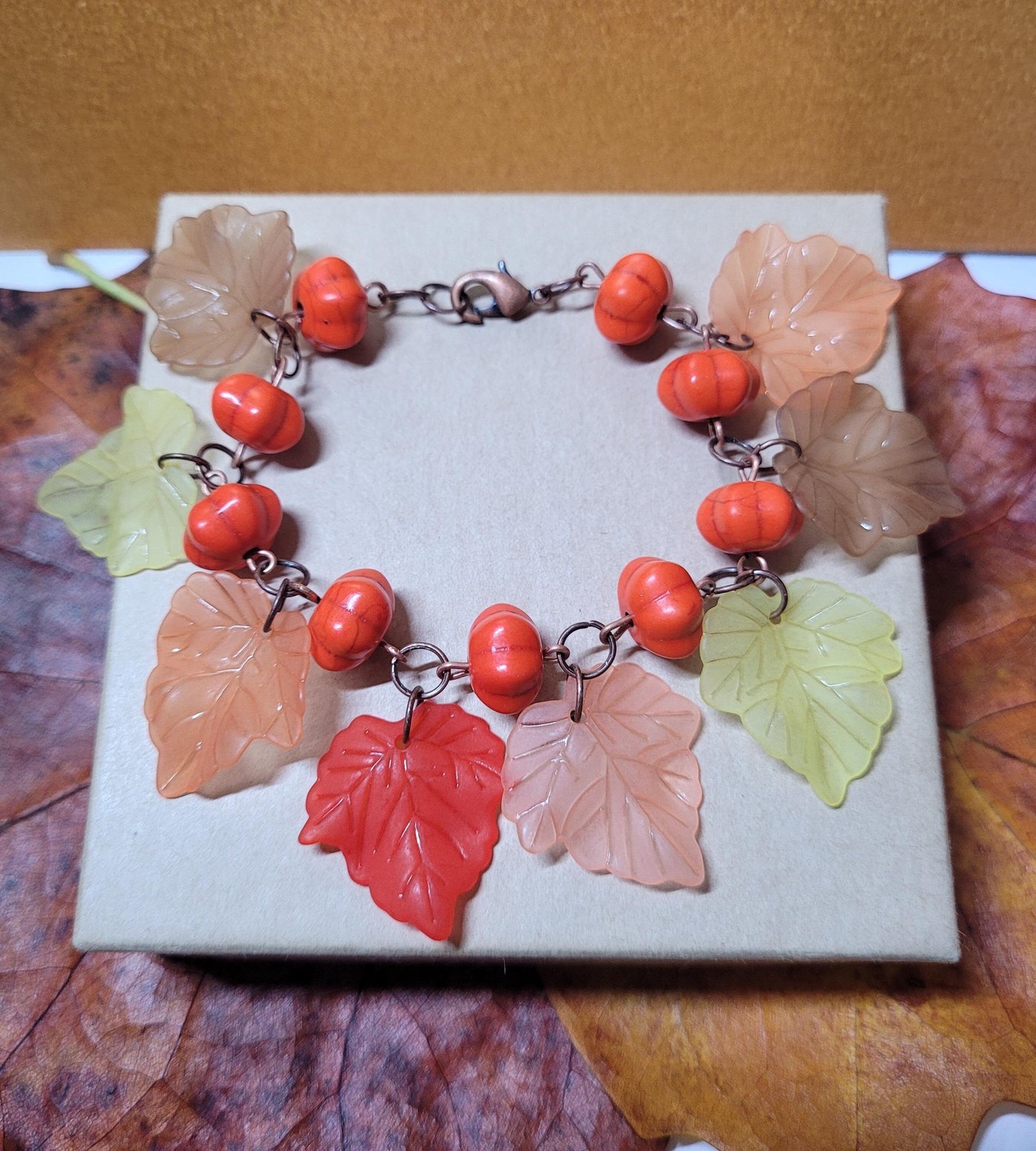 Pumpkin Bead and Leaf Charm Bracelet